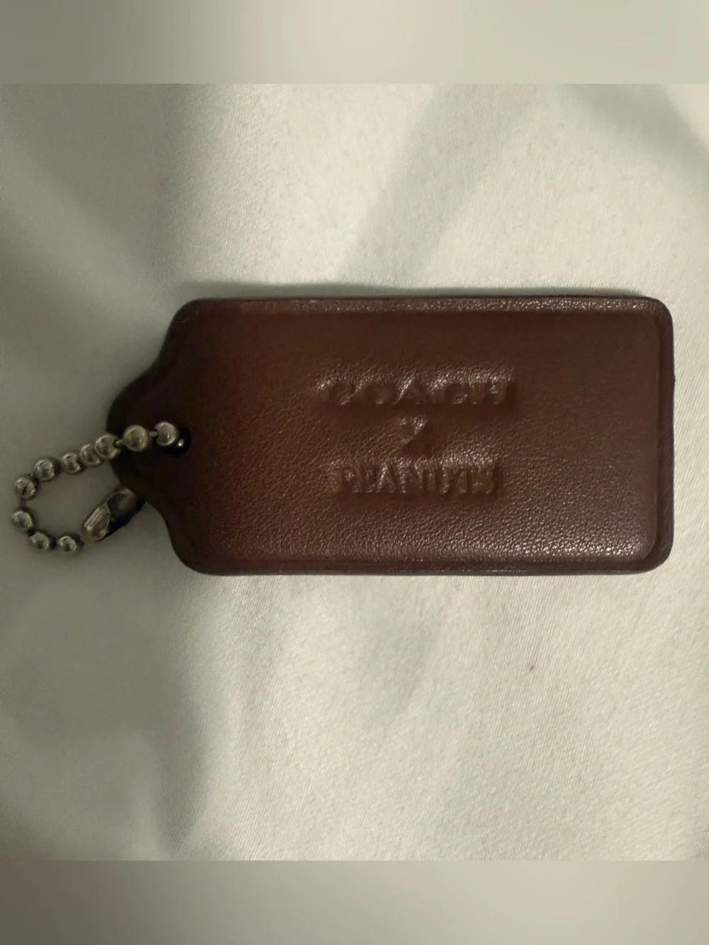 Coach and Peanuts Collab brown Hangtag!